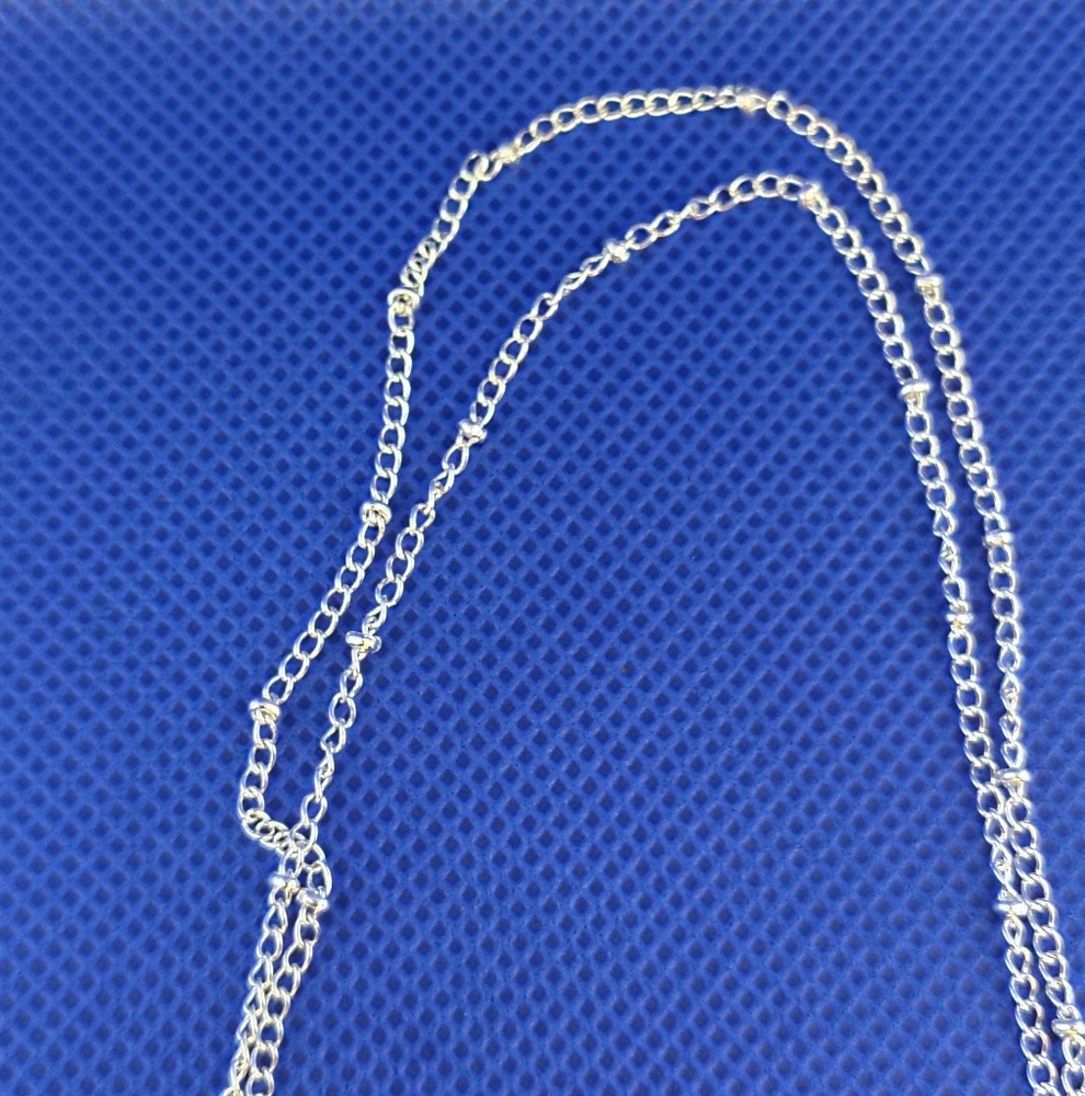 Elegant Silvertone Cross Necklace - Picture 4 of 4
